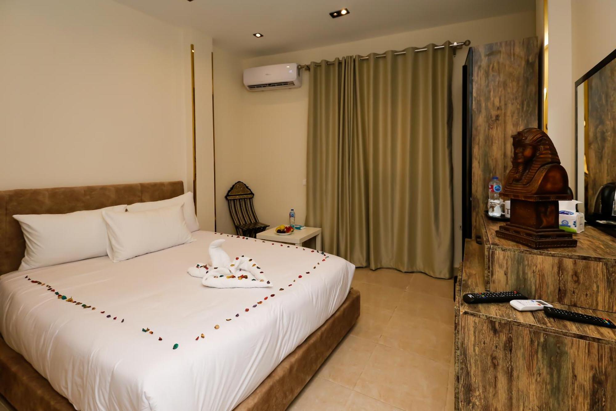 Taj Pyramids View Inn Kafret el-Gabal Exterior foto